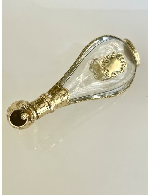 Perfume bottle in crystal and gold